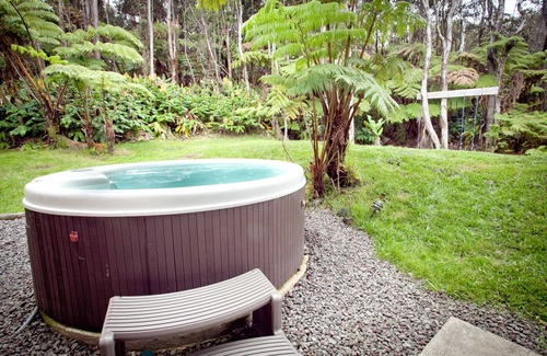 Volcano House | Beautiful home with hot tub in native rainforest