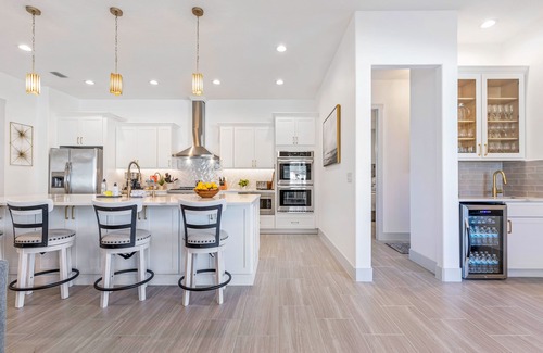 Palm Coast House | Beautiful house with heated pool, full kitchen, central AC, and washer/dryer