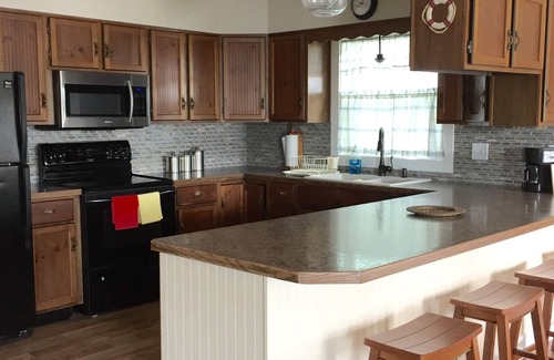 Twin Lake House | Beautiful Lake Front Home with Private Dock.