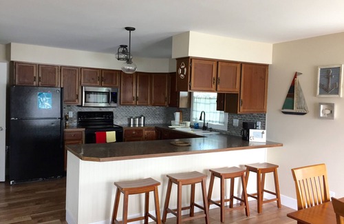 Twin Lake House | Beautiful Lake Front Home with Private Dock.