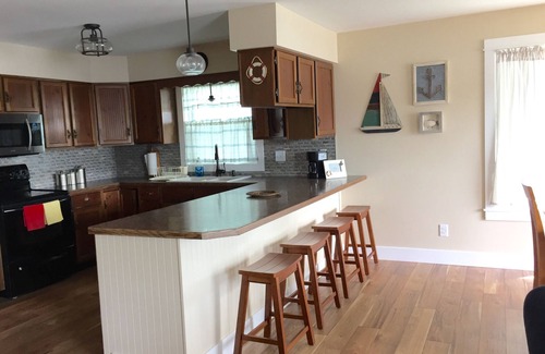 Twin Lake House | Beautiful Lake Front Home with Private Dock.