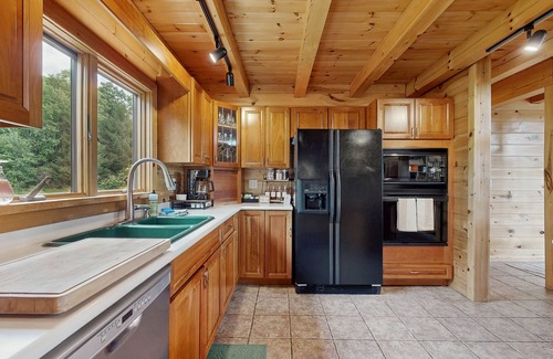 Dundee House | Beautiful lake view home with decks, grill, soaking tub & fireplace