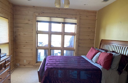 Broaddus House | Beautiful Lakefront Log Cabin that will take your breath away.
