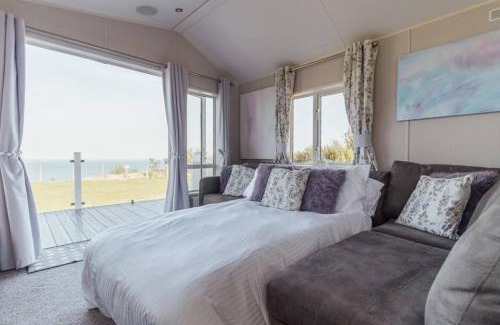 Sheerness House | Beautiful lodge - stunning sea views, dog friendly