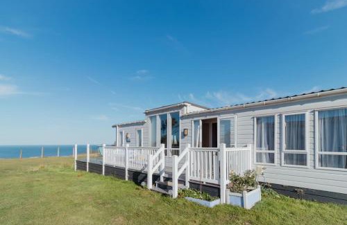 Sheerness House | Beautiful lodge - stunning sea views, dog friendly