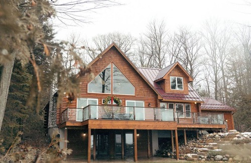 Suttons Bay House | Beautiful Log Cabin on the Bay!