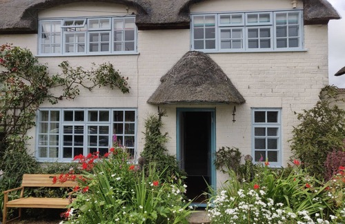 Winterton-on-Sea Cottage | Beautiful mid century thatched cottage in the prettiest part of Winterton-on-Sea