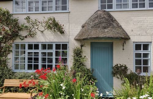 Winterton-on-Sea Cottage | Beautiful mid century thatched cottage in the prettiest part of Winterton-on-Sea
