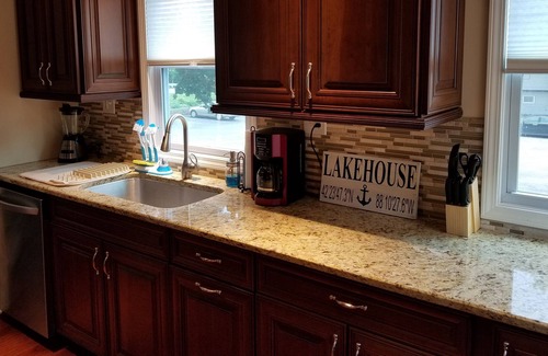 Fox Lake House | Beautiful Nautical 4/3 Waterfront with Bonus Apartment, Hot Tub, and Large Deck