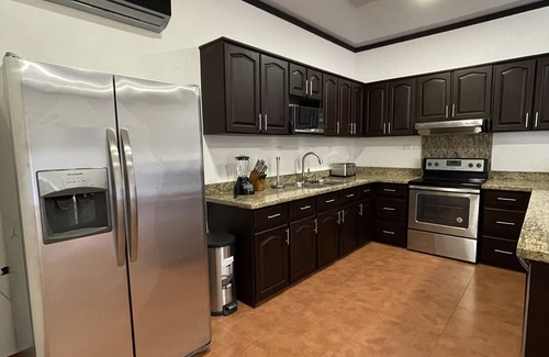 Chachagua Condo | Beautiful New 3 Bedroom 3 Bath Condo with Private Courtyard and Attached Garage