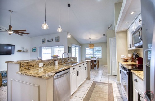Englewood East House | Beautiful Open Concept Pool House With Lanai and Private Fenced In Yard