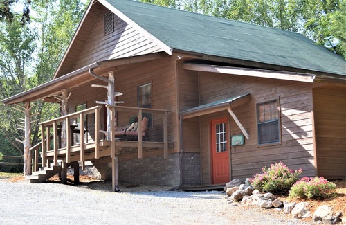 Flippin House | Beautiful River House that sits on the banks of the White River, with docks.