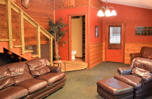Flippin House | Beautiful River House that sits on the banks of the White River, with docks.