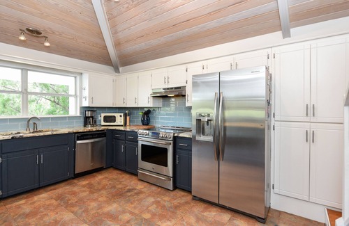 St. George Island House | Beautiful St.George Island pool home, large patio pool surround & fire pit area.