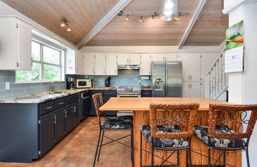 St. George Island House | Beautiful St.George Island pool home, large patio pool surround & fire pit area.