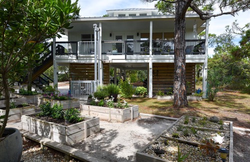 St. George Island House | Beautiful St.George Island pool home, large patio pool surround & fire pit area.