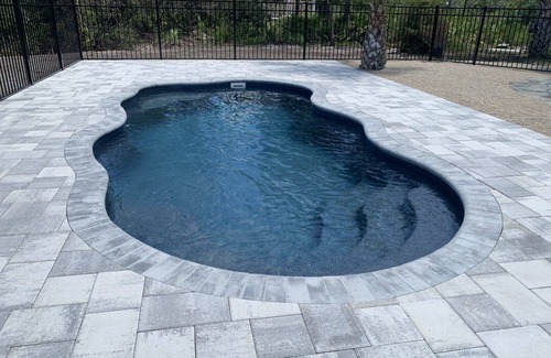 St. George Island House | Beautiful St.George Island pool home, large patio pool surround & fire pit area.