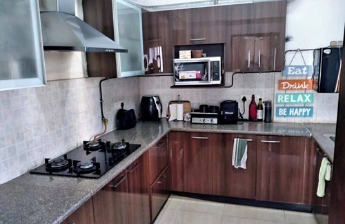 Noida Apartment | Beautiful Serviced apartment with garden and pool view