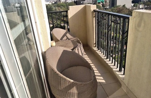 Noida Apartment | Beautiful Serviced apartment with garden and pool view