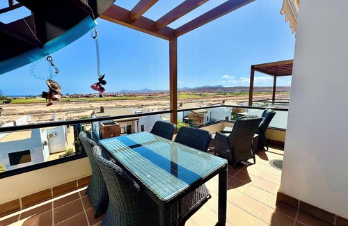 Caleta de Fuste Apartment | Beautiful south facing penthouse apartment with amazing views in Caleta de Fuste