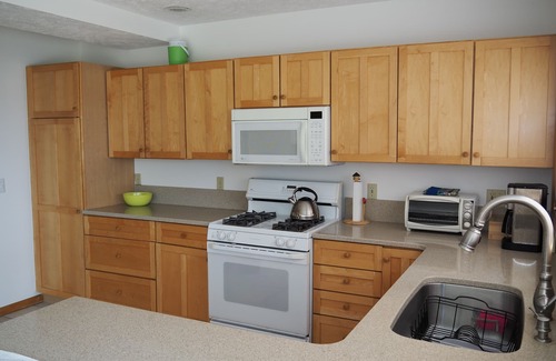 Traverse City House | Beautiful spot on Lake Leelanau- 4 bedrooms-includes dock and kayaks.