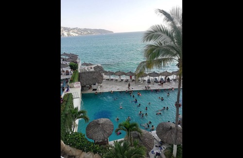 Club Deportivo Apartment | Beautiful Twin Towers Suite with balcony and stunning sea view