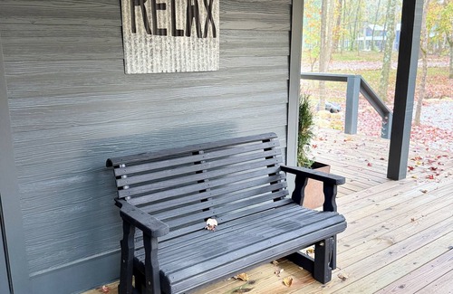 Monteagle House | Beautiful Tiny Home with Large Porch, Outdoor Fireplace & TV, and Hot Tub