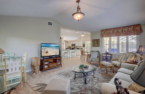 Bonita Springs House | Beautiful Tropical Inspired Pool Home in Private Community <2 Miles To Beach