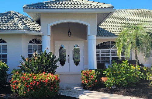 Bonita Springs House | Beautiful Tropical Inspired Pool Home in Private Community <2 Miles To Beach