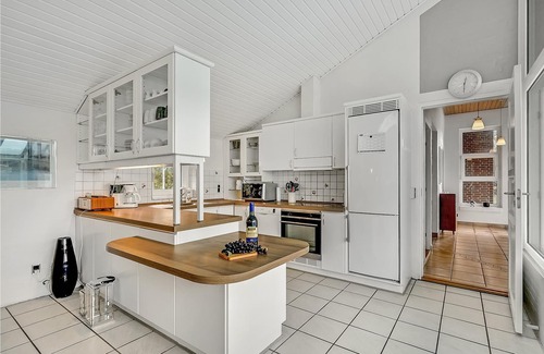 Vejers Strand House | Beautiful vacation home with pool on a large natural plot and placed in a well-established vacation