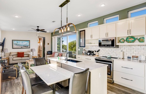 Doctor's Arm House | Beautiful waterfront home with central AC, dock, lovely balcony & patio