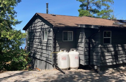 Trent Lakes Cottage | Beautiful Waterfront Cottage BUCKHORN Huge Dock Lots Beds & Parking WIFI NO FEES