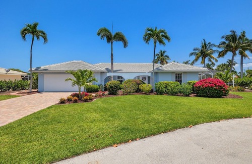 Shell Harbor House | Beautifully newly redesigned canal front pool home minutes to beach! NEW!