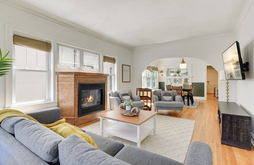 Minneapolis House | Beautifully Remodeled Main Floor Unit w/ Cozy Fireplace! 5 Minutes to Downtown!