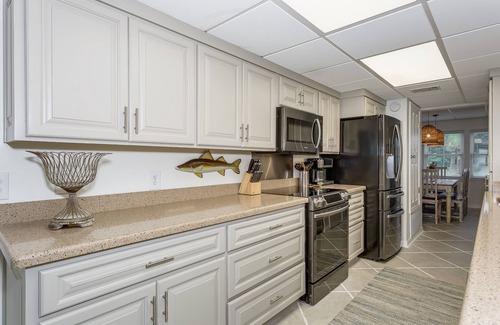 Villa Sabine House | Beautifully renovated 3BR townhome with boat slip just steps from the beach!