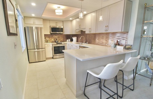 Fort Pierce Condo | Beautifully Renovated Condo - Golf Course Enclosed Balcony View - Oceanfront Community