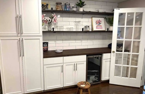 Rochester House | Beautifully renovated Brighton home on private inside corner lot.