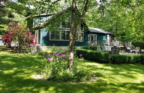East Branch House | Beaverkill river front fly fishing cozy cabin hideaway.