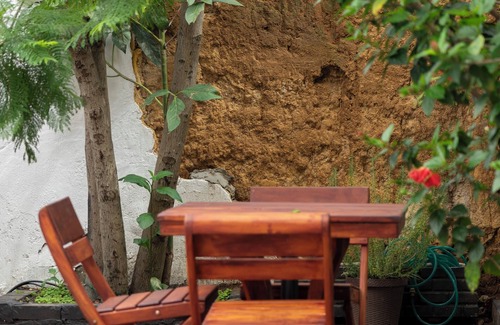 Zona 4 House | bed in shared dorm Rio Hostel in Guatemala City Zone 4, pedestrian streets.