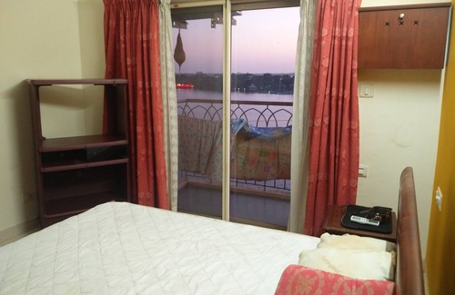 Shenoys Apartment | Bedroom apartment facing backwater