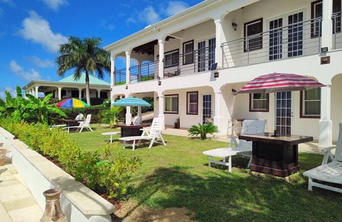 Dickenson Bay Apartment | Belvedere Holiday Home