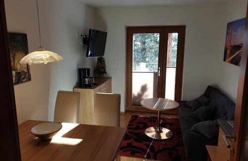 Turracher Hohe Apartment | Bergheim Schmidt, Almhütten im Wald Appartments an der Piste Alpine Huts in Forrest Appartments near Slope