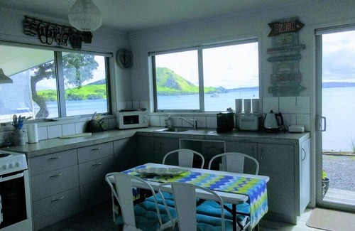 Whangarei Heads Apartment | "Beside The Sea."More than an apartment! Absolute waterfront. Swim steps away.