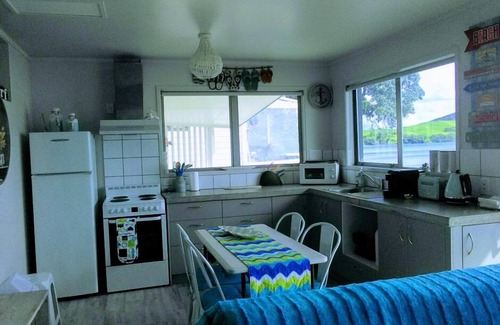 Whangarei Heads Apartment | "Beside The Sea."More than an apartment! Absolute waterfront. Swim steps away.