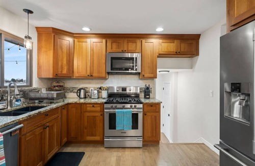 Arvada House | Best Home near Denver with Lake View & Heated Pool Open~Family~Peloton, 75" TV