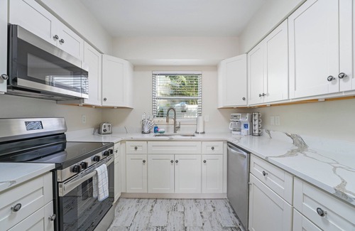 Anna Maria House | BEST LOCATION! NORTH END OF ANNA MARIA, FL STEPS TO BEACH & DINING - LOWER UNIT