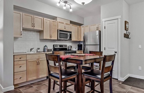 Canmore Condo | Best Relaxing King Bed Suite/Mtn. View, Heated Pool & Hot Tubs