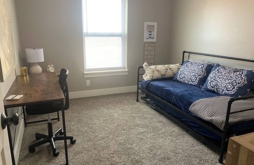 Quad Cities Condo | Bettendorf Condo: Fireplace, King Bed & Family Fun!