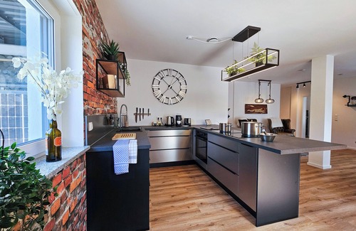 Altusried Apartment | better I industrial apartment I home theater
