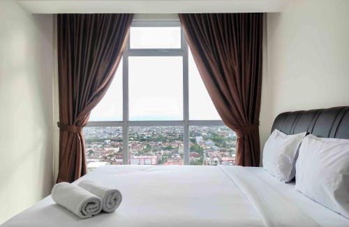 Panakkukang Apartment | Big and Comfy 3BR at Vida View Apartement By Travelio